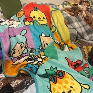 2 blankets for baby, a hat, blue sweater, 2 sleeping bags